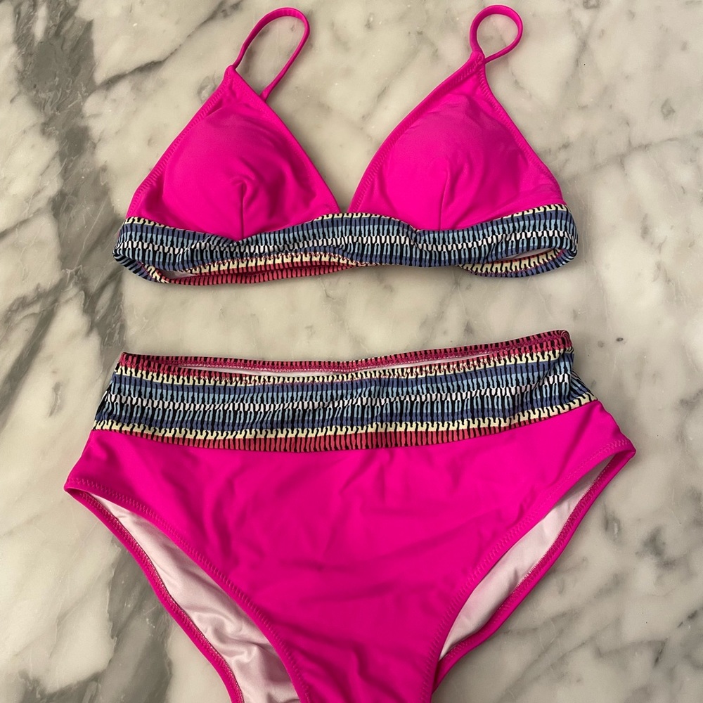 Hot pink bikini with boho print border trim.